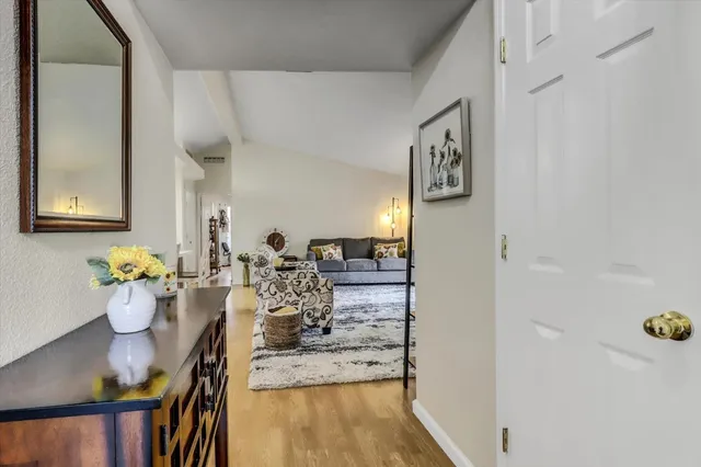 a view of a living room and dining room