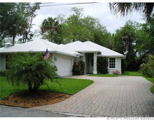 585 Southwest Rustic Circle Stuart, FL 34997 - Photo 1 of 16 Exterior Front.
