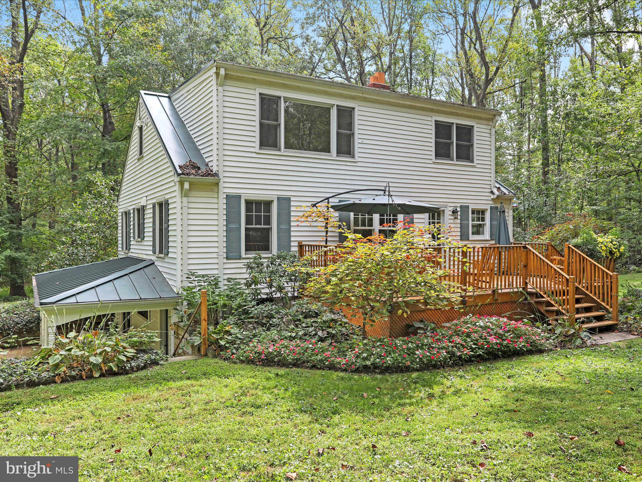 20830 Peach Tree Road Dickerson, MD 20842 - Photo 1 of 1 a view of a house with a yard