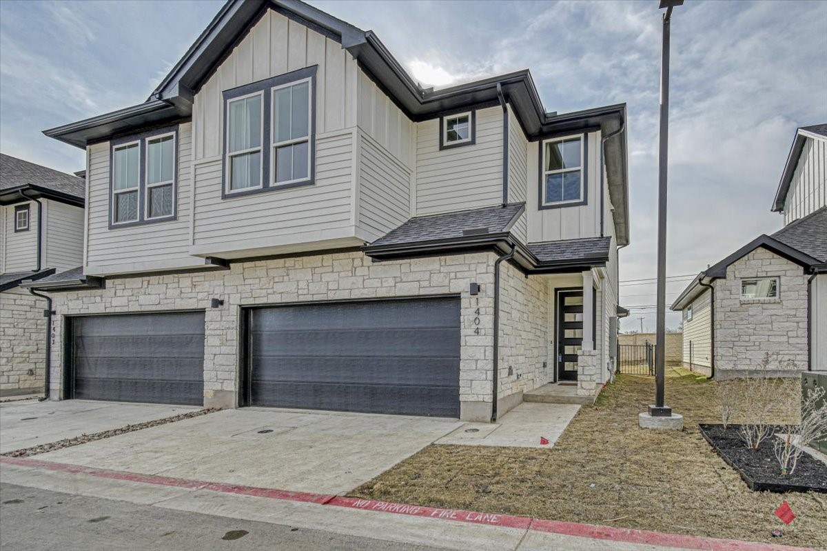 2600 Gattis School Road, Unit 11011104 Round Rock, TX 78664 - Photo 1 of 1 a front view of a house with a garage