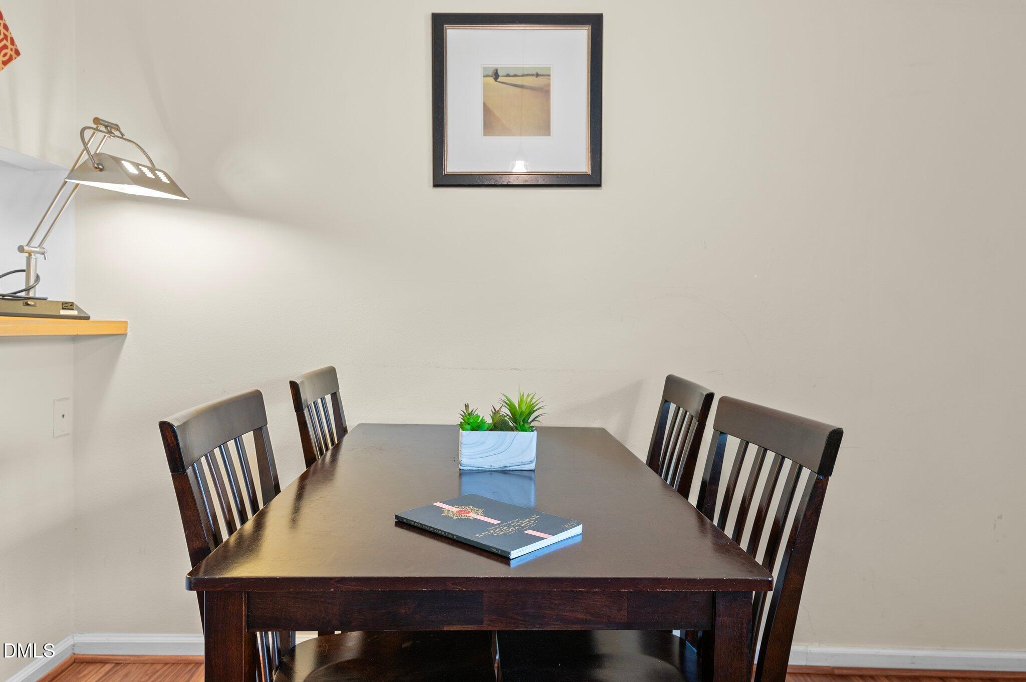 807 West Trinity Avenue, Unit 153 Durham, NC 27701 - Photo 16 of 39 a view of a dining room with furniture