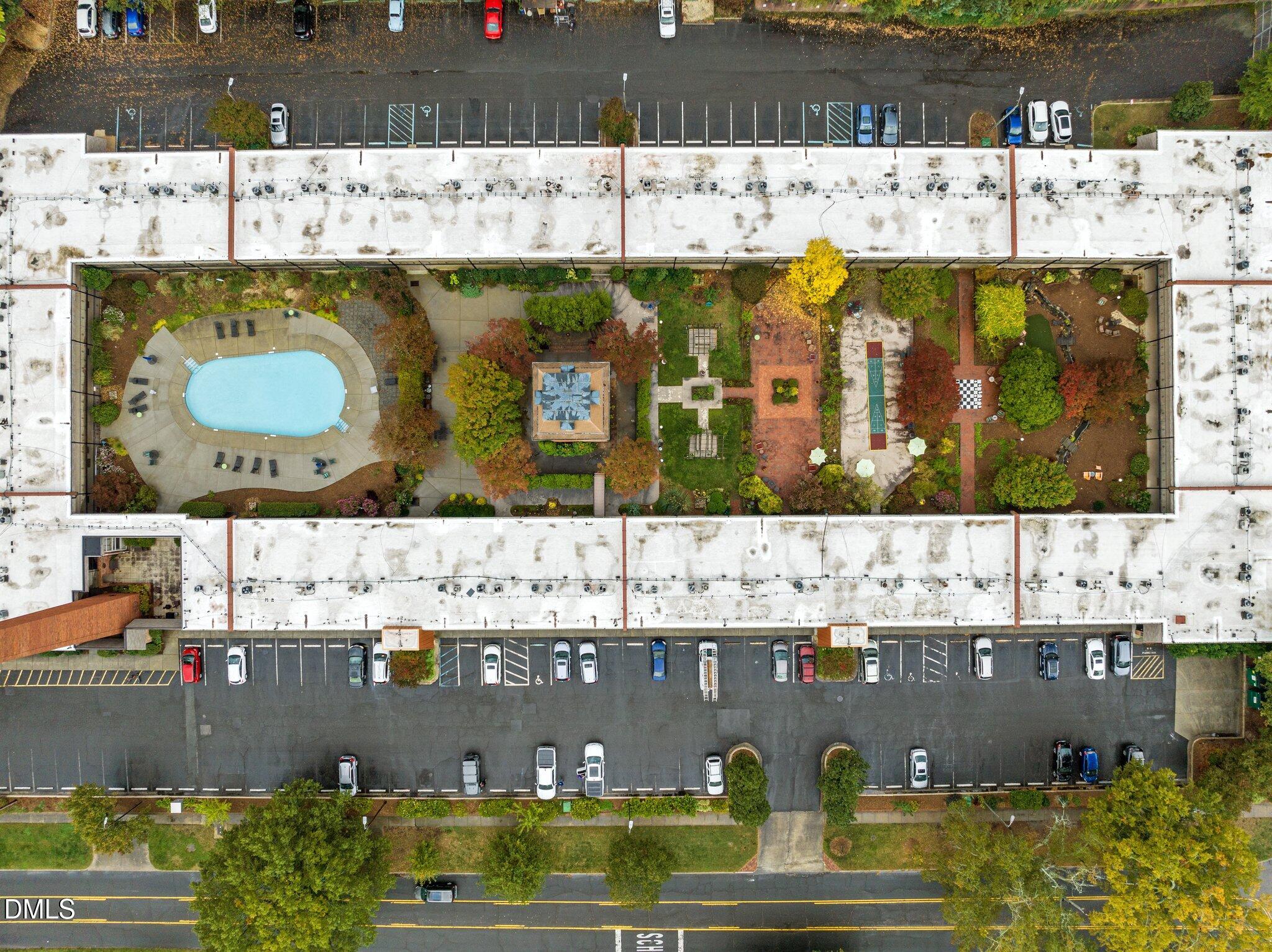 807 West Trinity Avenue, Unit 153 Durham, NC 27701 - Photo 25 of 39 a view of building with outdoor space
