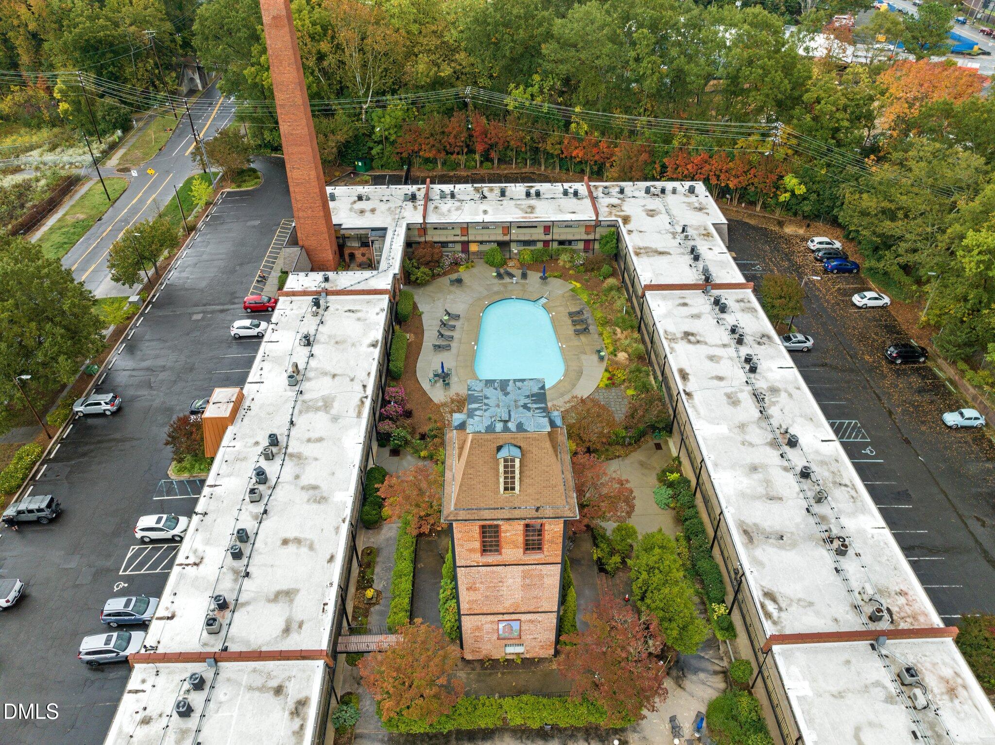 807 West Trinity Avenue, Unit 153 Durham, NC 27701 - Photo 26 of 39 an aerial view of a residential houses with yard