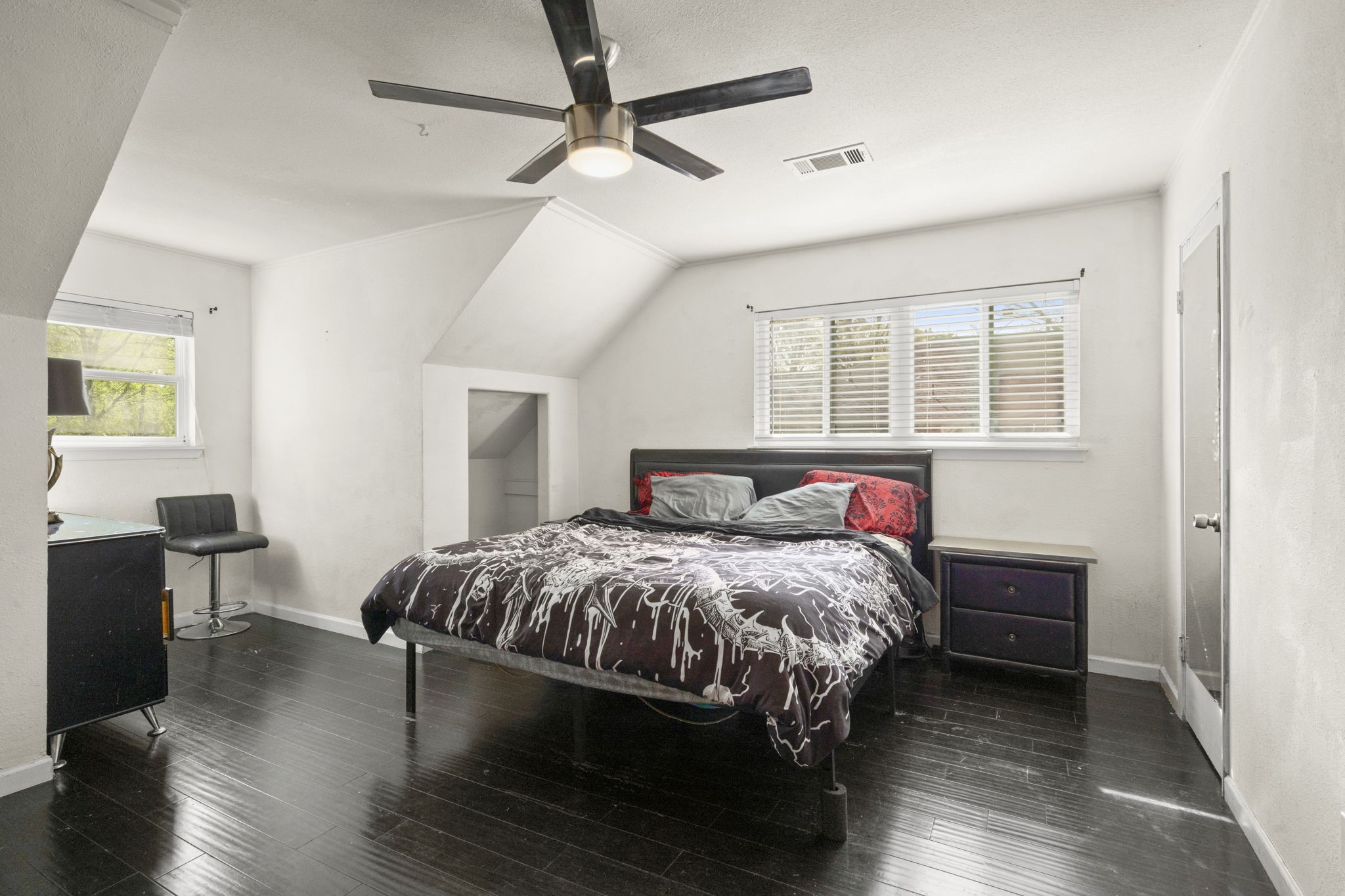 3414 Rustling Pines Street Spring, TX 77380 - Photo 20 of 26 a bedroom with a bed and wooden floor