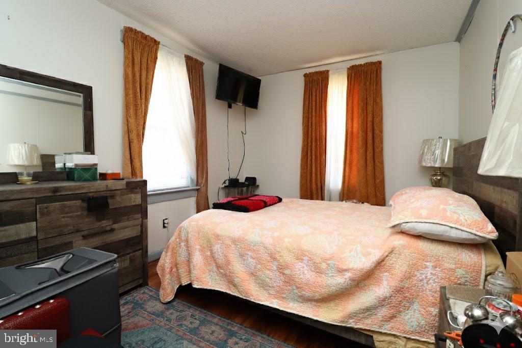 850 Orchard Avenue Runnemede, NJ 08078 - Photo 10 of 26 a bedroom with a bed and a window