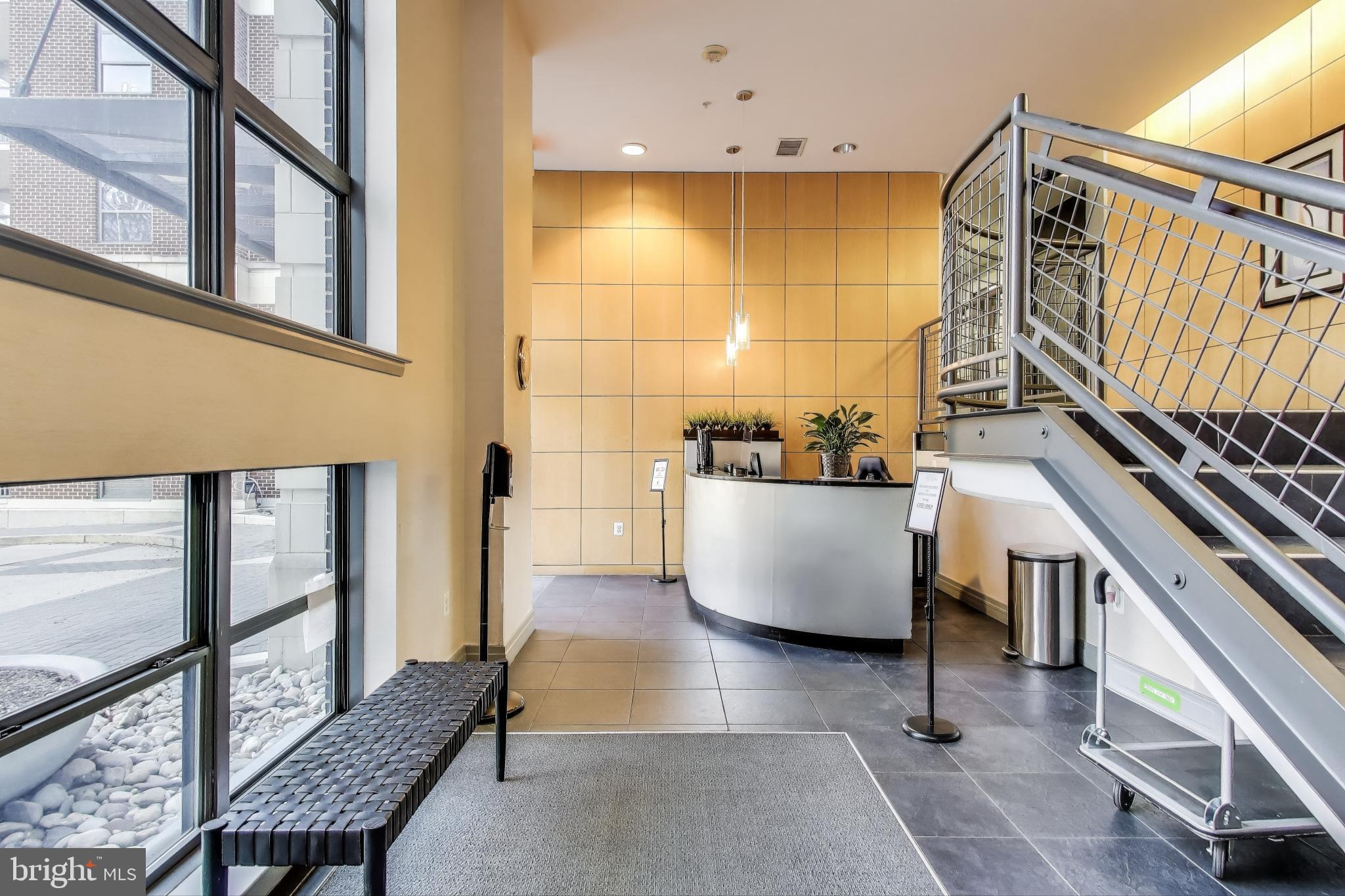 2020 12th Street Northwest, Unit 506 Washington, DC 20009 - Photo 5 of 7 a bathroom with a bathtub and next to a window