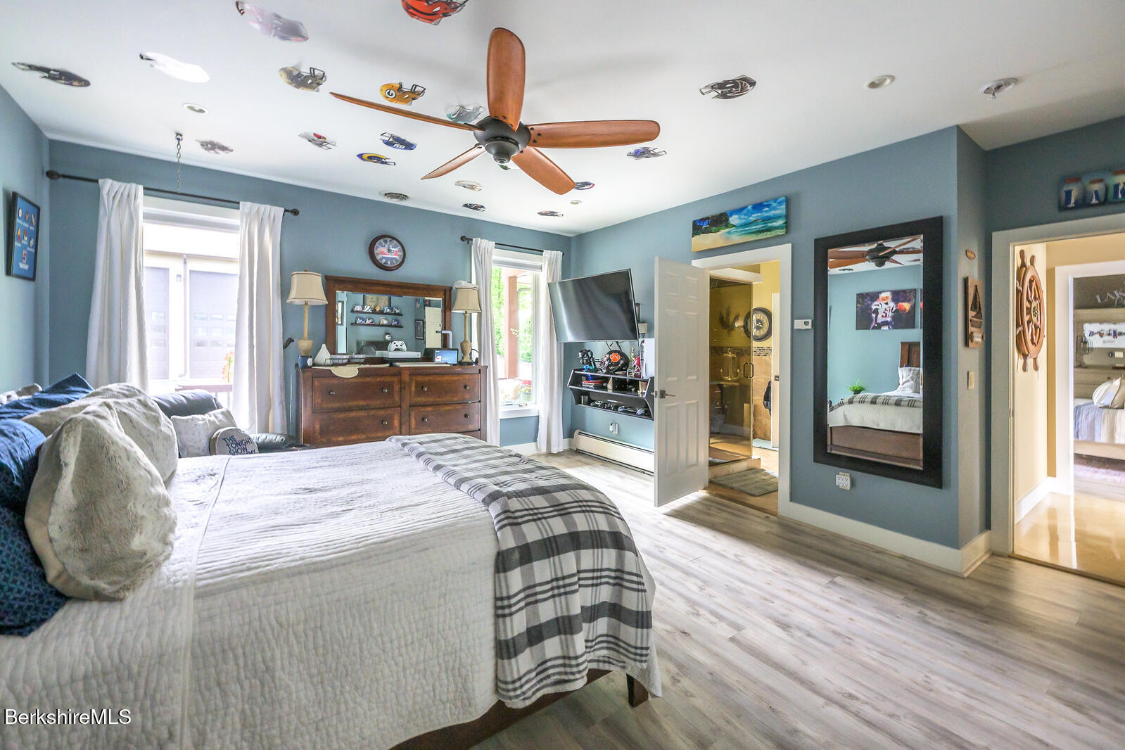 140 Hancock Road Pittsfield, MA 01201 - Photo 18 of 40 a bed room with a bed mirror and a window