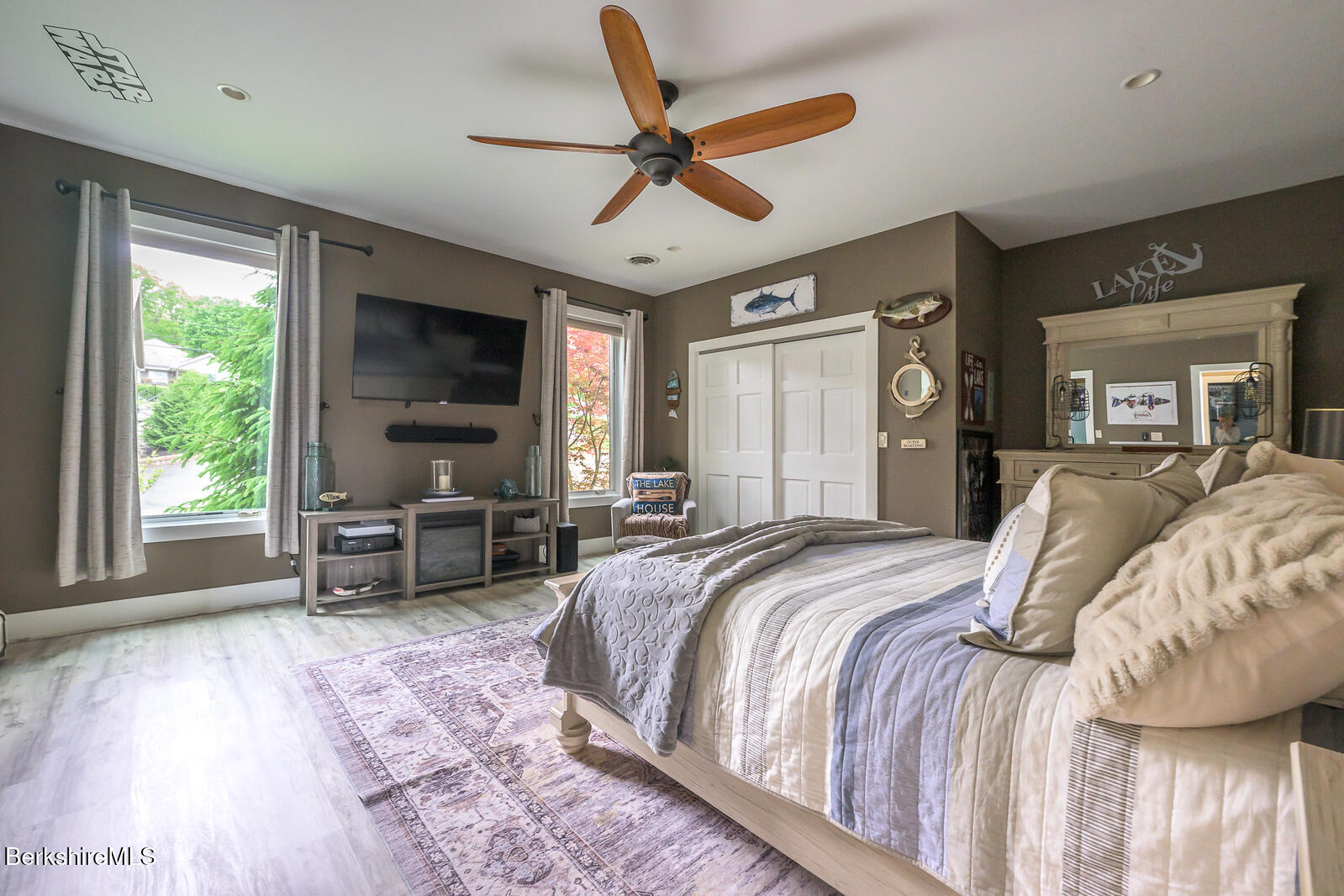 140 Hancock Road Pittsfield, MA 01201 - Photo 20 of 40 a bed room with a bed and a chair