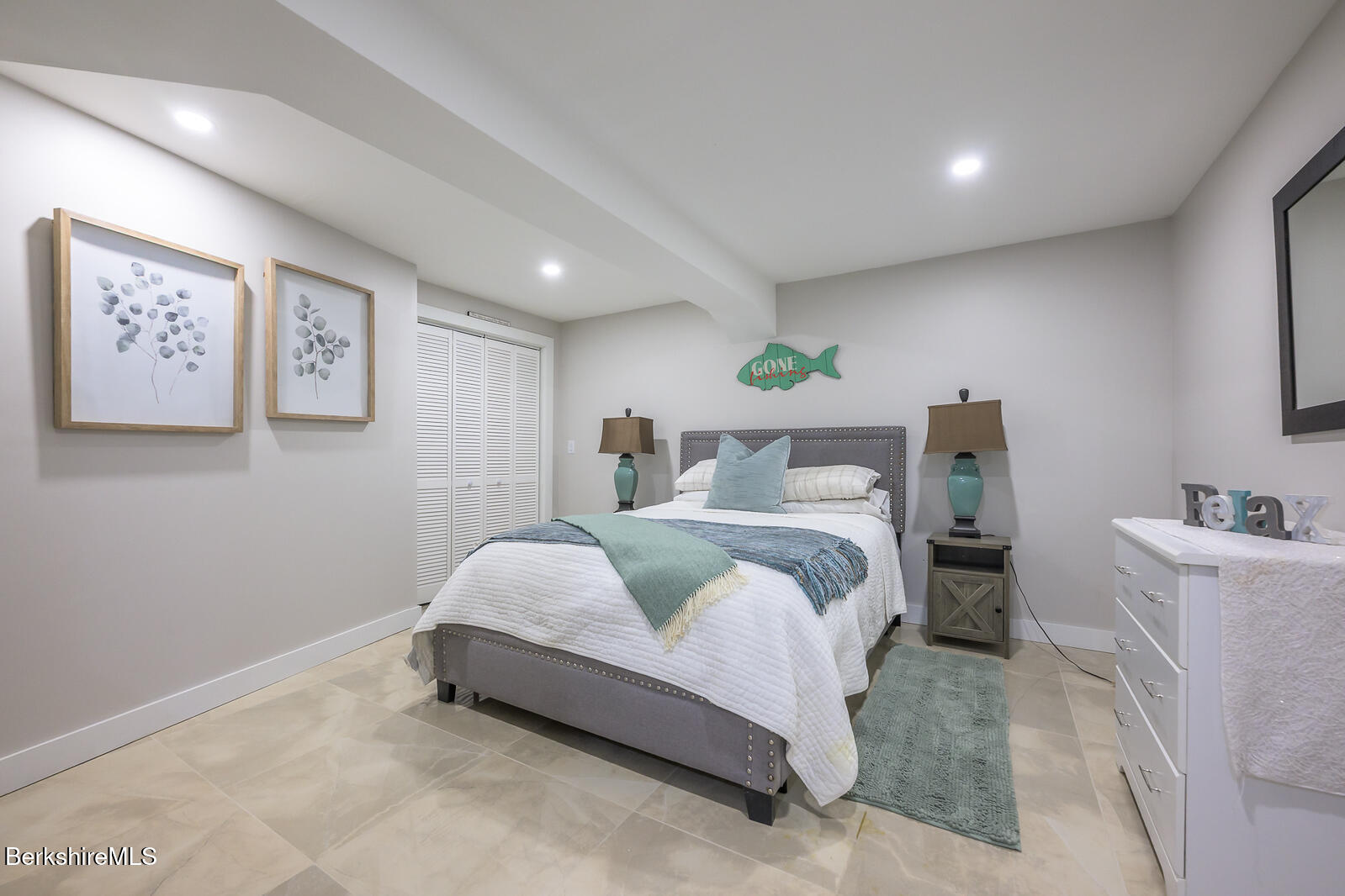 140 Hancock Road Pittsfield, MA 01201 - Photo 40 of 40 a bedroom with a bed and a cabinets