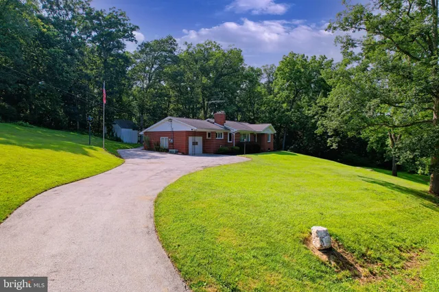 a picture of a bathroom with a shower