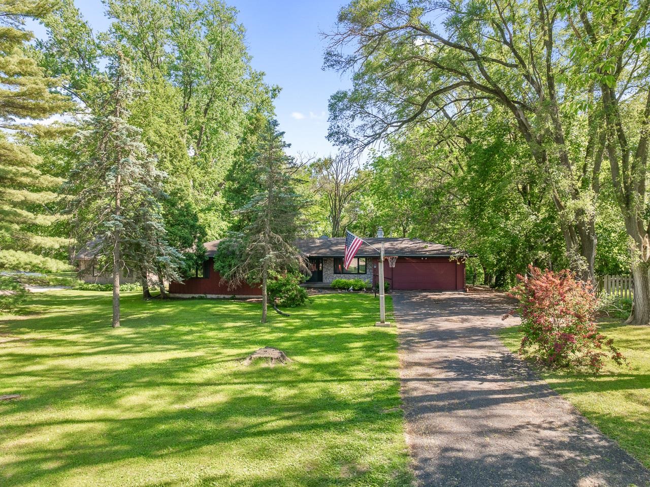 6537 Newburg Road Rockford, IL 61108 - Photo 1 of 29 a backyard of a house with table and chairs