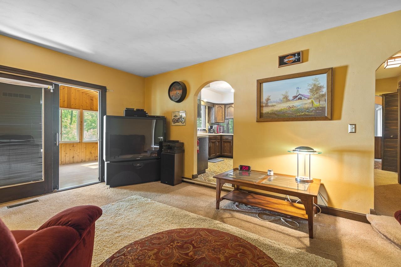 6537 Newburg Road Rockford, IL 61108 - Photo 13 of 29 a bedroom with furniture and a rug