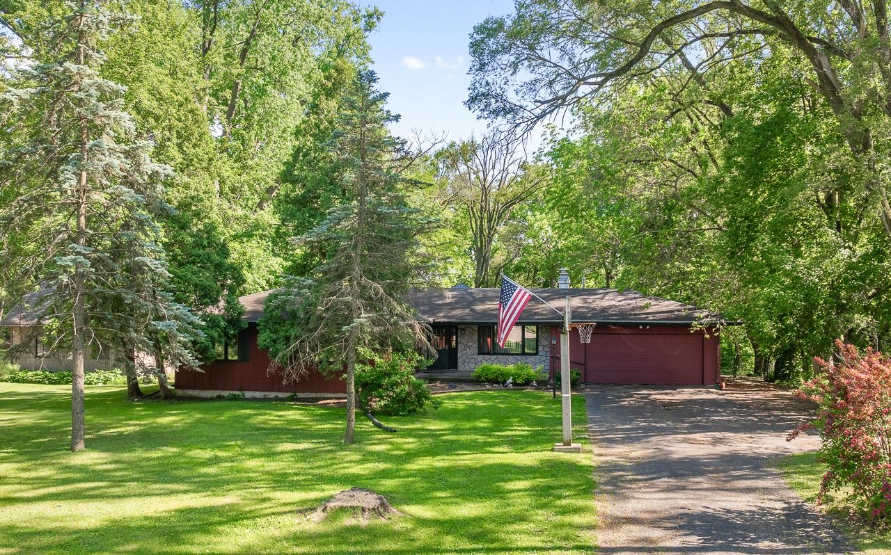 6537 Newburg Road Rockford, IL 61108 - Photo 28 of 29 a view of a house with a backyard