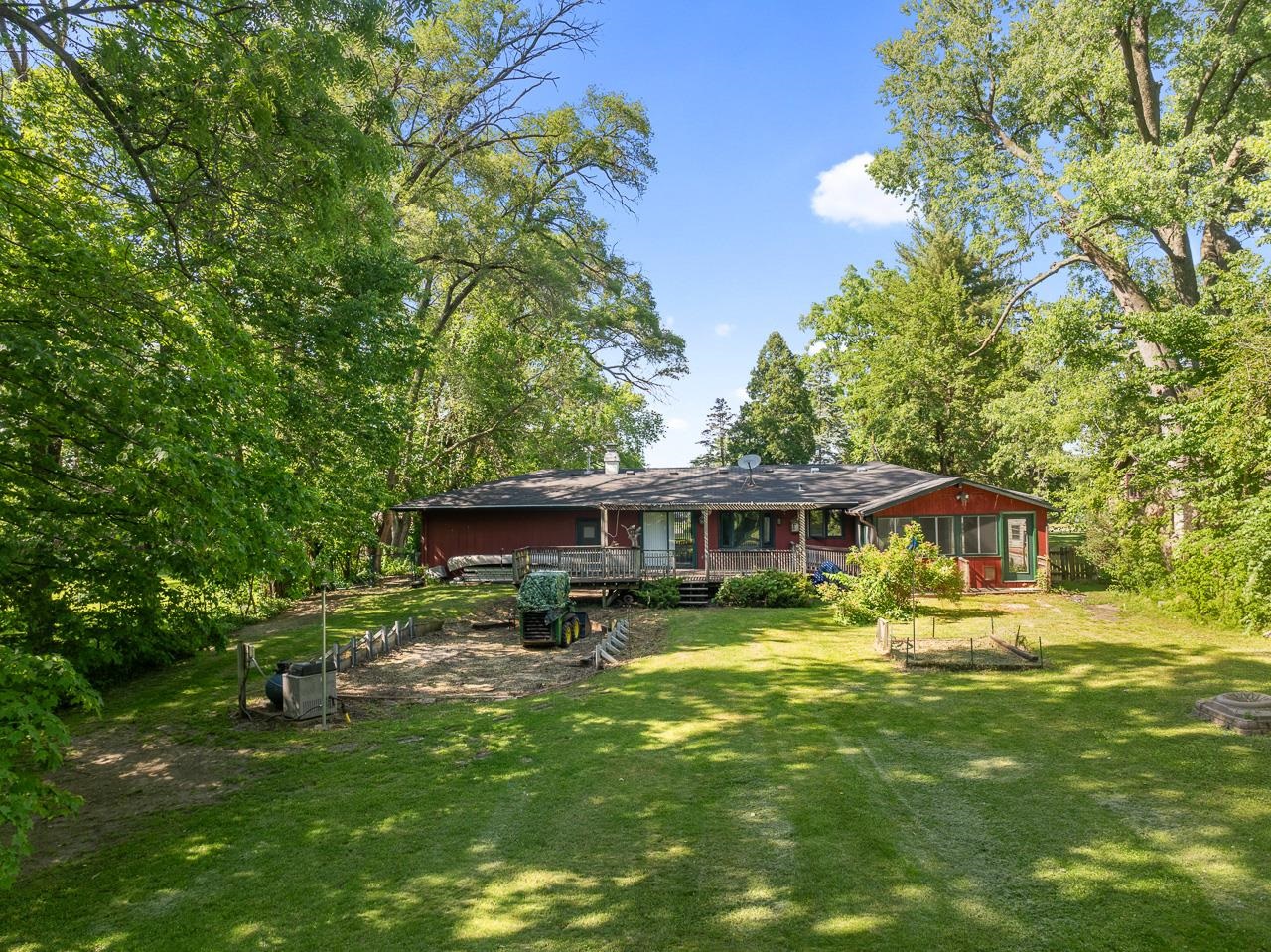 6537 Newburg Road Rockford, IL 61108 - Photo 3 of 29 a view of a house with a yard porch and sitting area