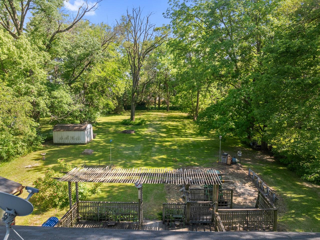 6537 Newburg Road Rockford, IL 61108 - Photo 5 of 29 a view of a wooden door with a yard