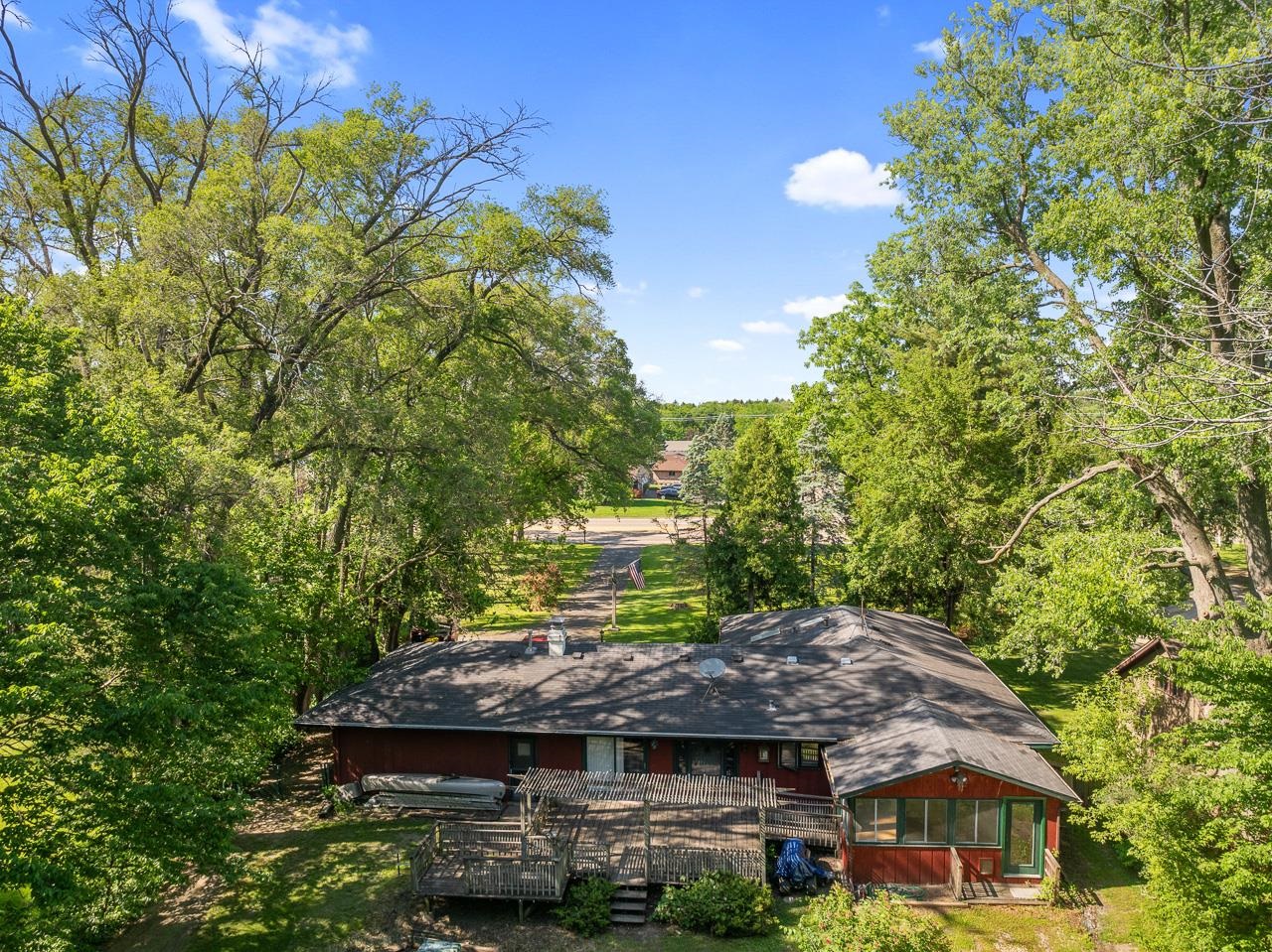 6537 Newburg Road Rockford, IL 61108 - Photo 6 of 29 a backyard of a house with lots of green space