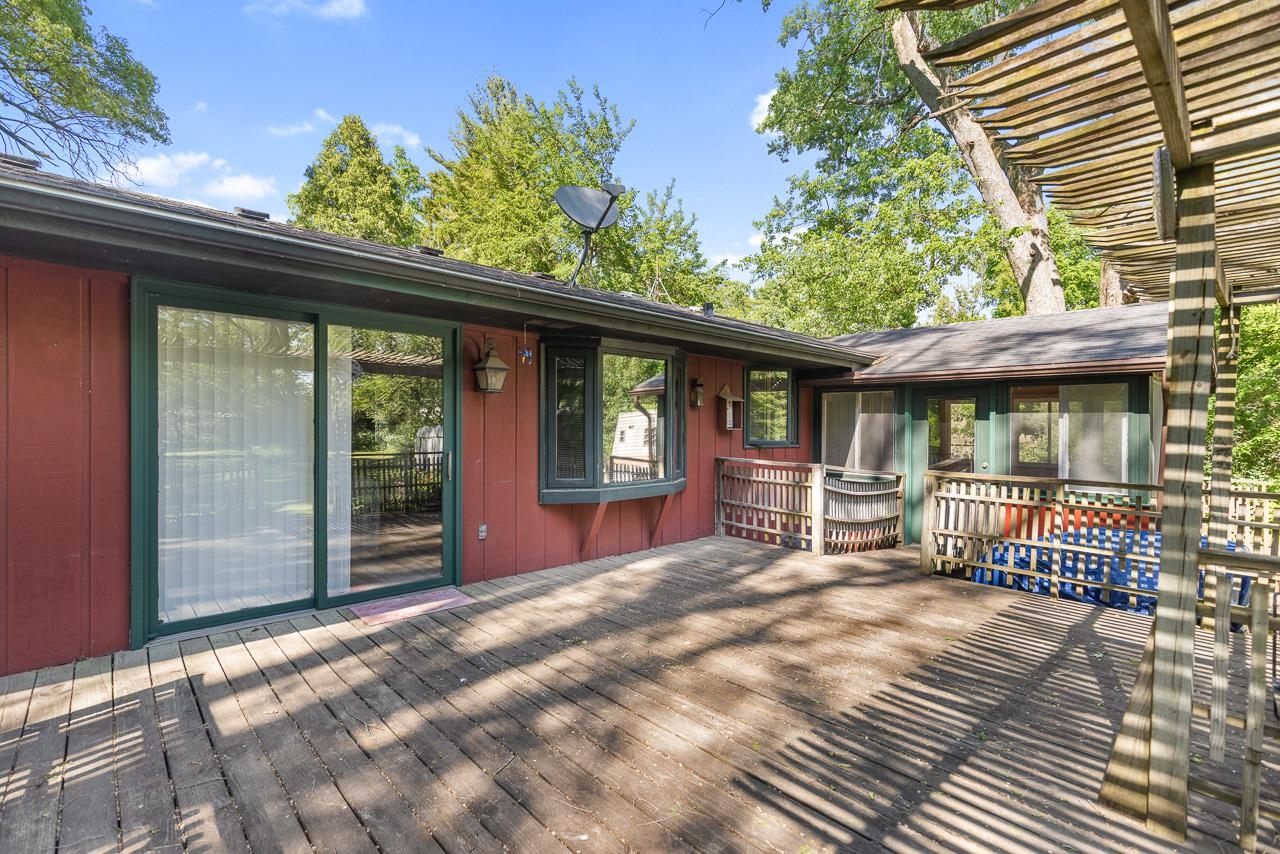 6537 Newburg Road Rockford, IL 61108 - Photo 7 of 29 a view of a house with a porch