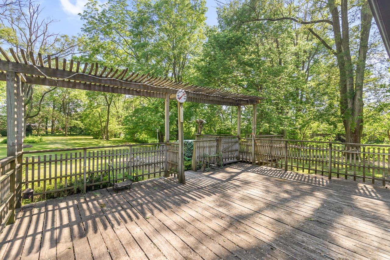 6537 Newburg Road Rockford, IL 61108 - Photo 8 of 29 a view of outdoor space with wooden floor