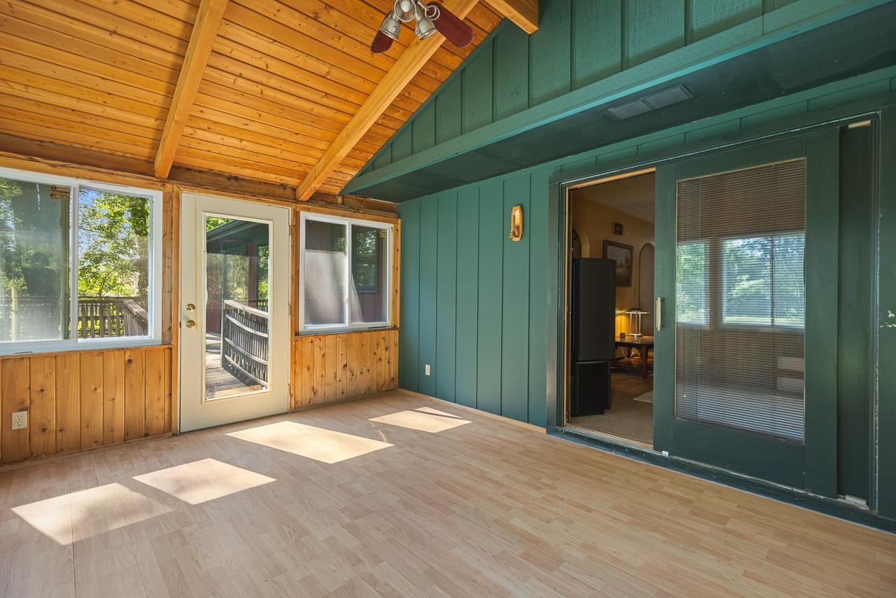 6537 Newburg Road Rockford, IL 61108 - Photo 10 of 29 a view of an empty room with large windows
