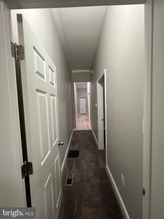 a view of hallway with stairs