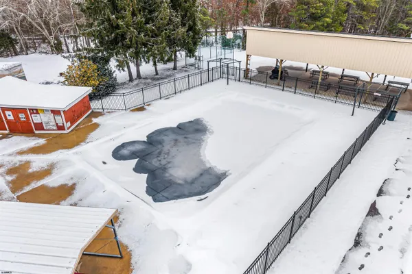 swimming pool view with a outdoor seating