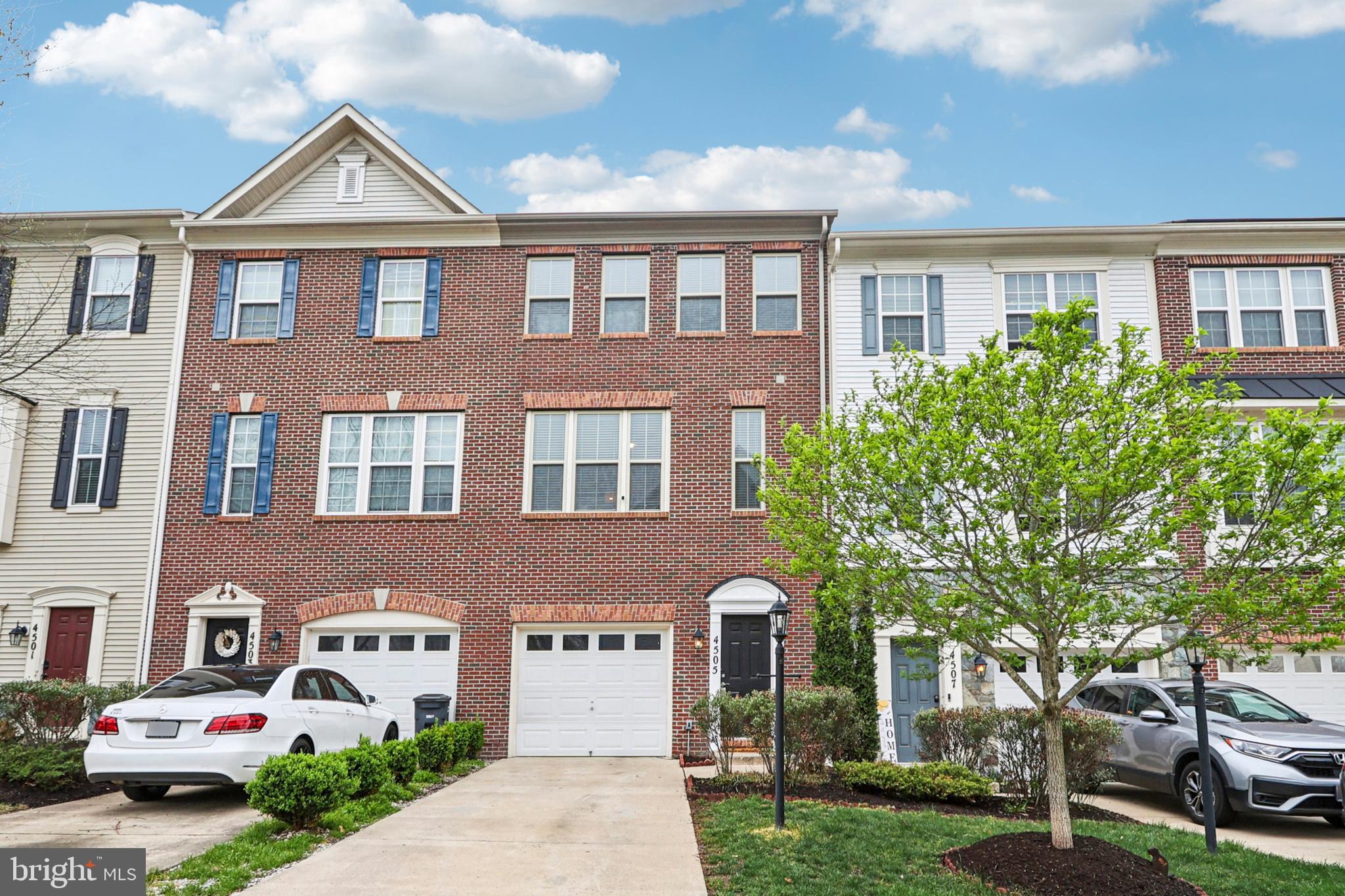 4505 Potomac Highlands Circle Triangle, VA 22172 - Photo 1 of 65 a front view of a house with garden