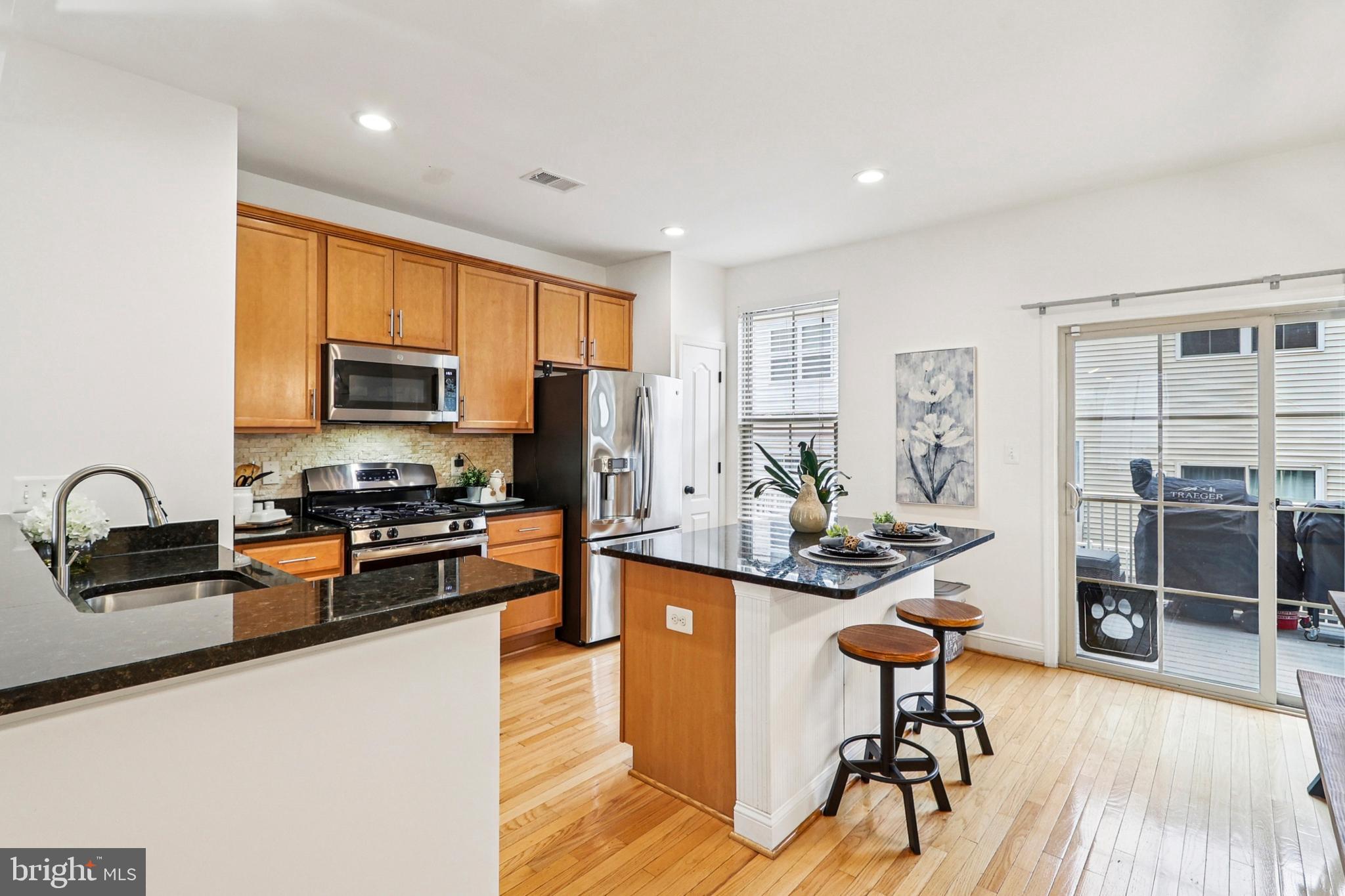 4505 Potomac Highlands Circle Triangle, VA 22172 - Photo 15 of 65 a view of a kitchen with workspace and a window