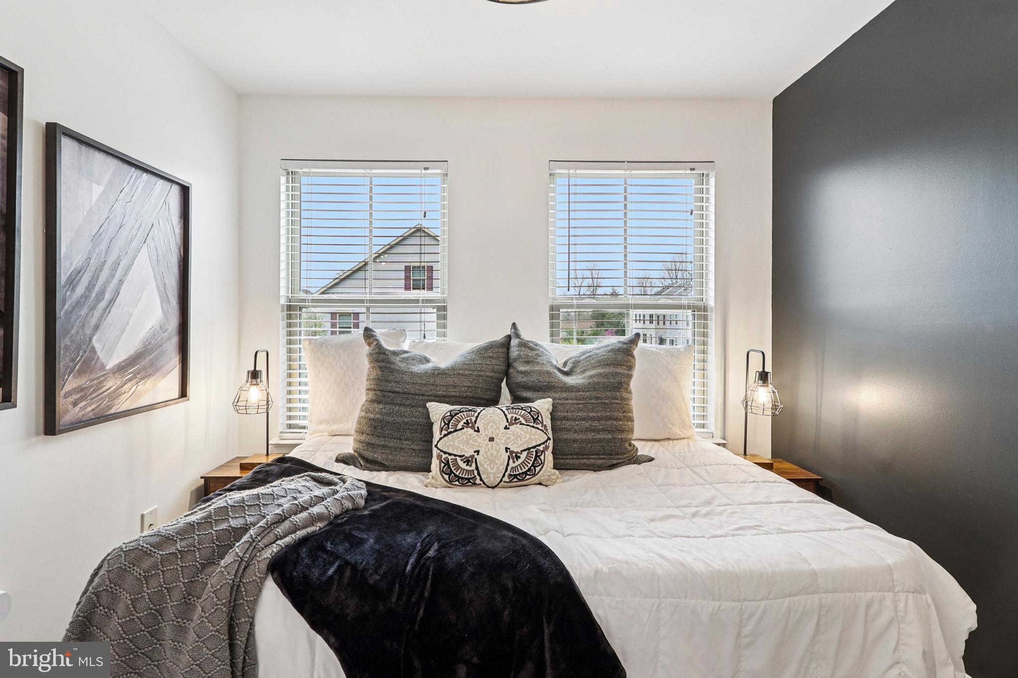4505 Potomac Highlands Circle Triangle, VA 22172 - Photo 50 of 65 a bedroom with bed and large window