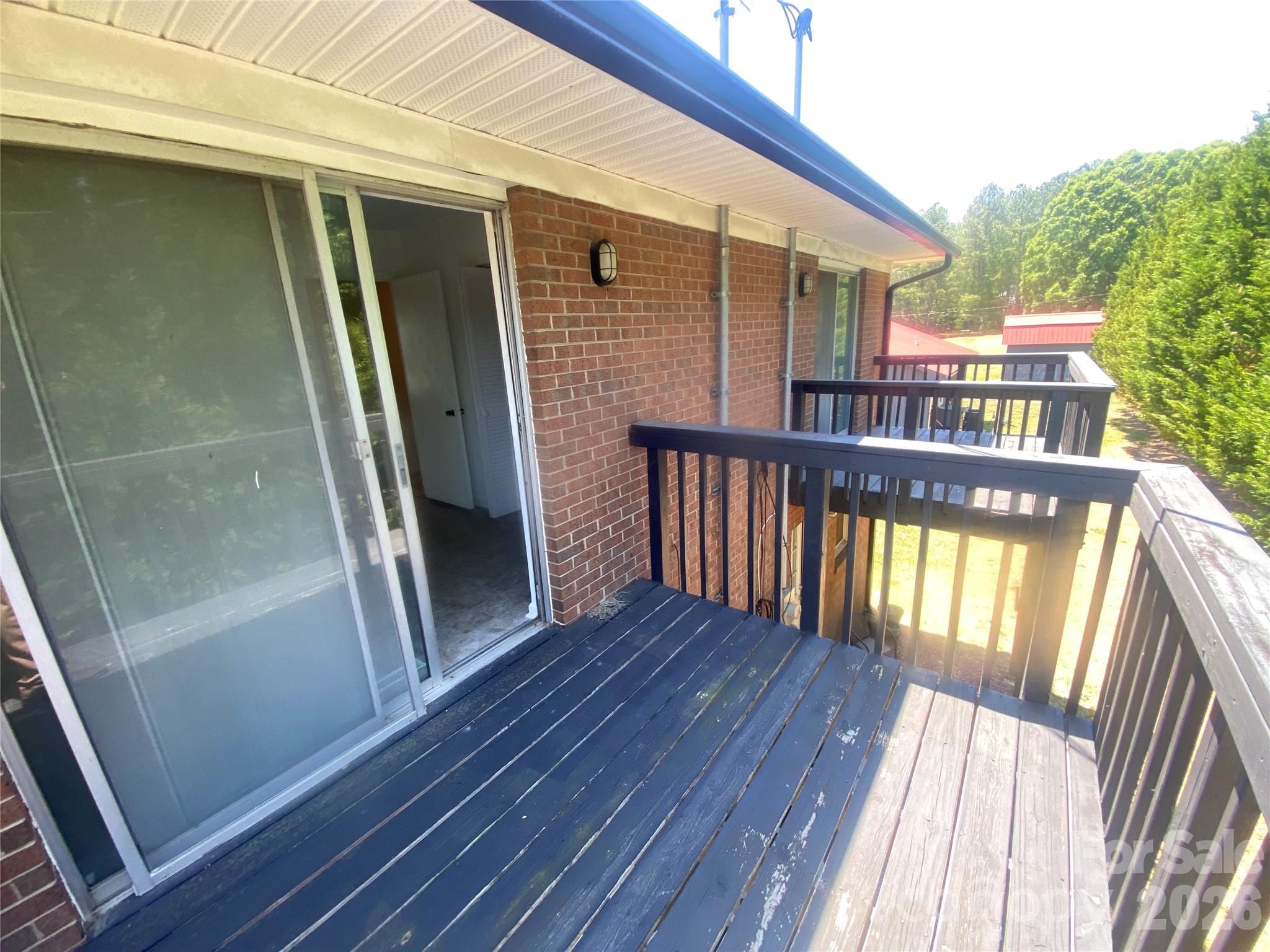 788 Coley Road Salisbury, NC 28146 - Photo 7 of 43 a view of balcony with wooden floor