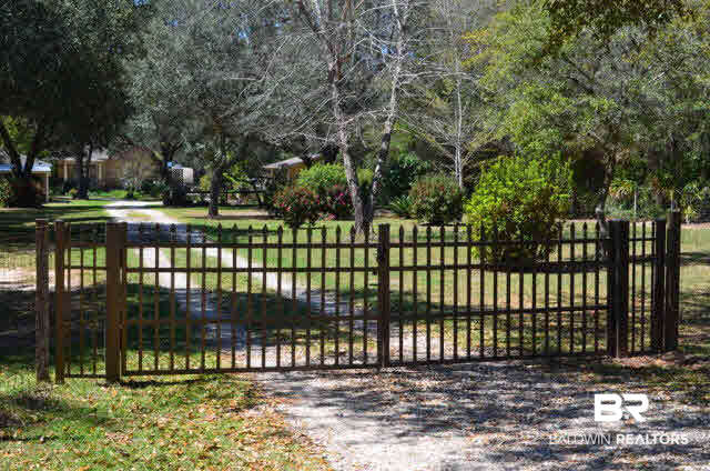 8919 Red Fish Pt Road Lillian, AL 36549 - Photo 40 of 46 Convenient gated entry.