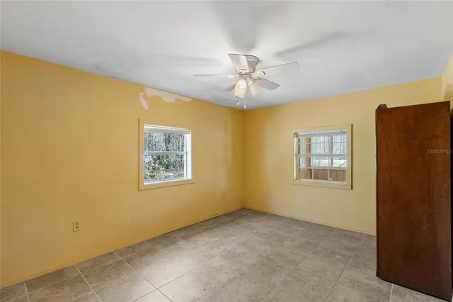 a bathroom with a double vanity sink a mirror a shower and vanity
