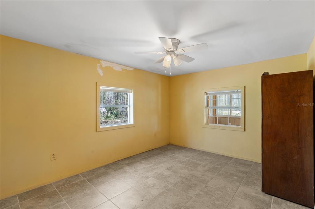 1317 Northeast Drew Road Lake City, FL 32055 - Photo 14 of 32 a view of an empty room with a window