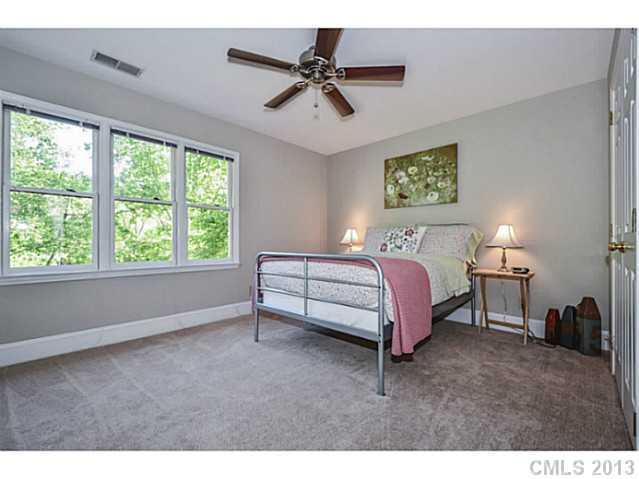 700 Beacon Knoll Lane Fort Mill, SC 29708 - Photo 12 of 16 a bedroom with a bed and a window