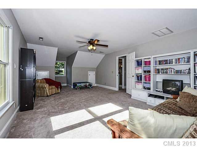700 Beacon Knoll Lane Fort Mill, SC 29708 - Photo 15 of 16 a living room with furniture and a fireplace