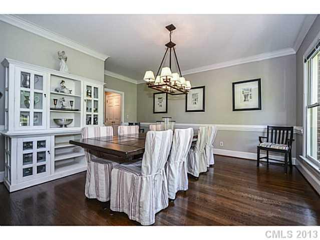 700 Beacon Knoll Lane Fort Mill, SC 29708 - Photo 3 of 16 a view of a dining room with furniture and wooden floor