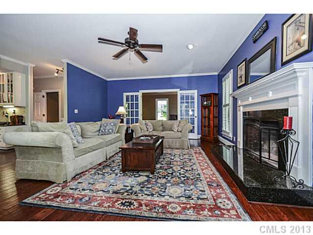 700 Beacon Knoll Lane Fort Mill, SC 29708 - Photo 5 of 16 a living room with furniture and a rug