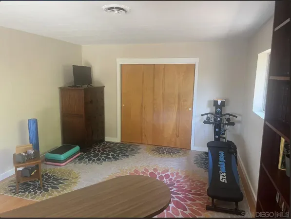 a view of a house with a garden