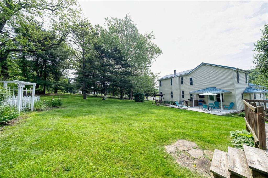 424 Joffre Cherry Valley Road Burgettstown, PA 15021 - Photo 11 of 40 a house view with a sitting space and garden