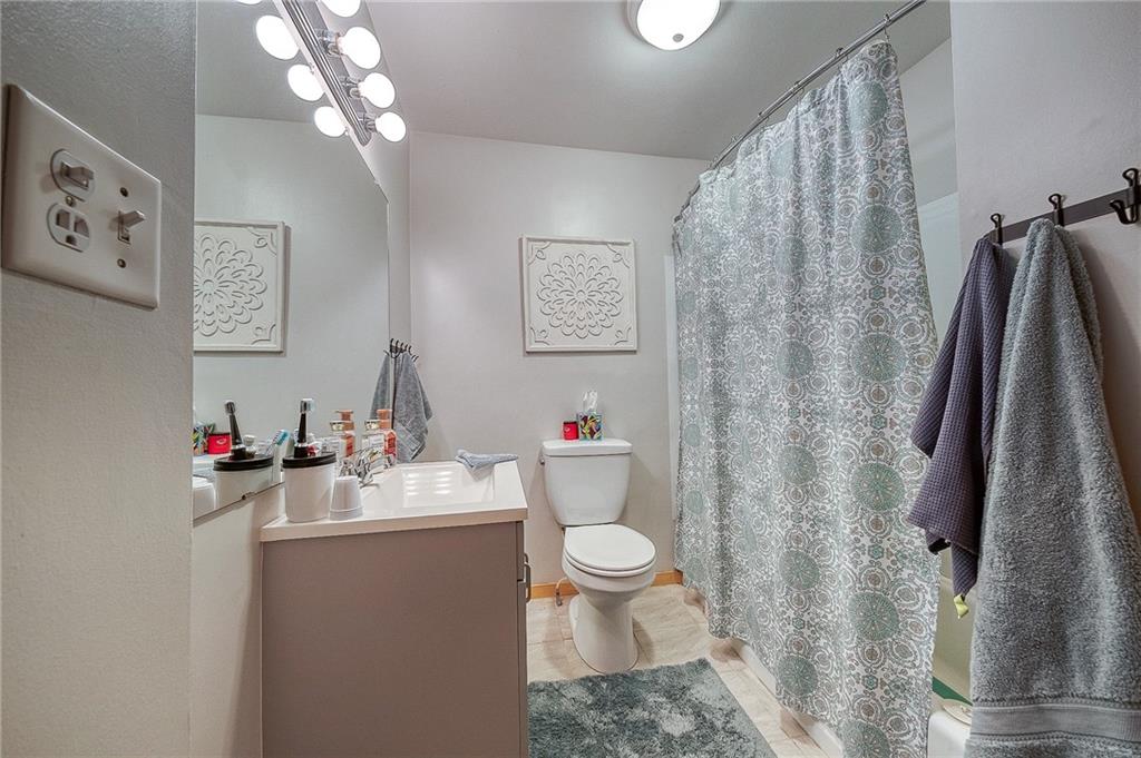 424 Joffre Cherry Valley Road Burgettstown, PA 15021 - Photo 22 of 40 a bathroom with a sink toilet and a mirror
