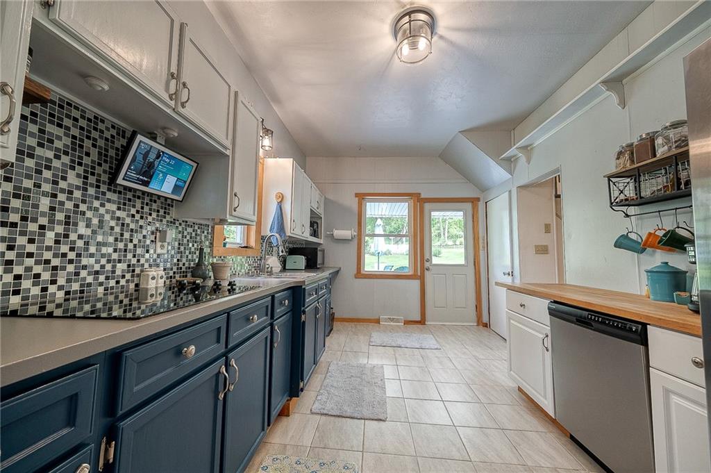 424 Joffre Cherry Valley Road Burgettstown, PA 15021 - Photo 25 of 40 a large kitchen with a large counter space a sink appliances and cabinets