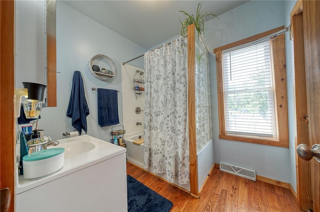 424 Joffre Cherry Valley Road Burgettstown, PA 15021 - Photo 31 of 40 a bathroom with a sink a mirror and a shower