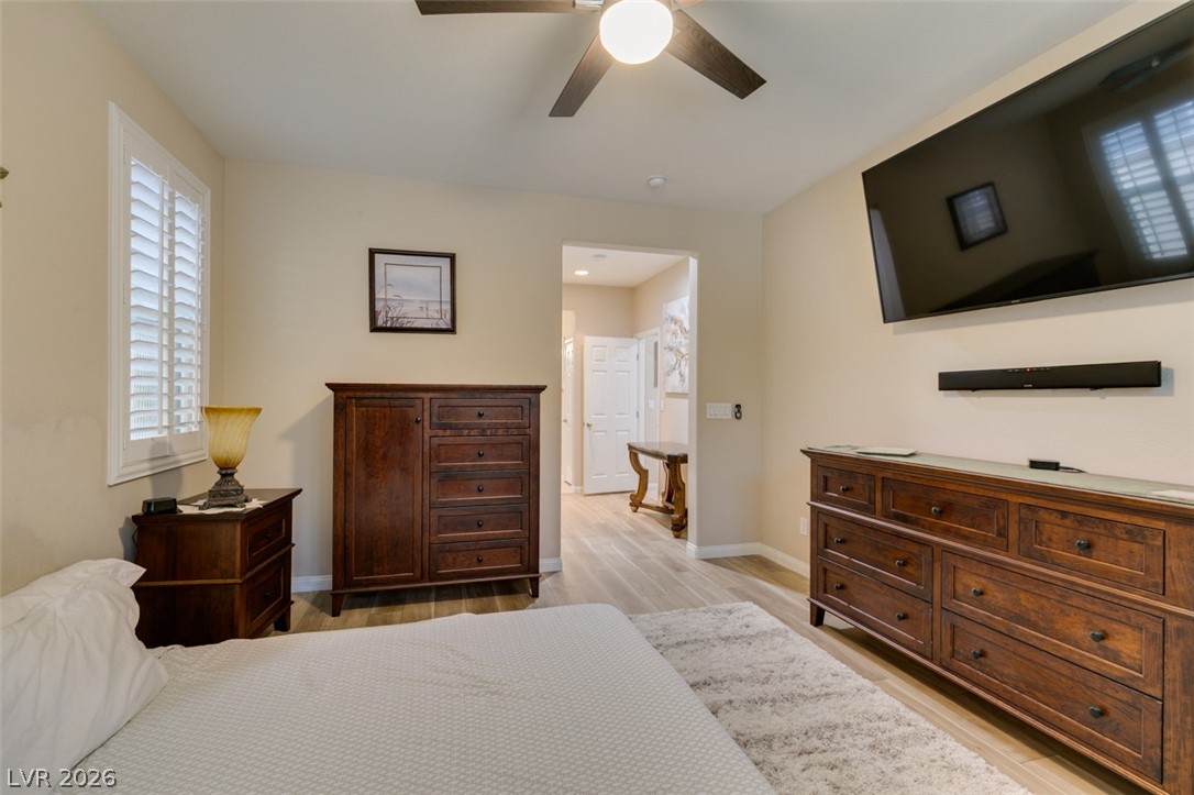 7375 Campbell Ranch Avenue Las Vegas, NV 89179 - Photo 23 of 45 LVP flooring, primary bathroom separated by private hallway and walk in closet.