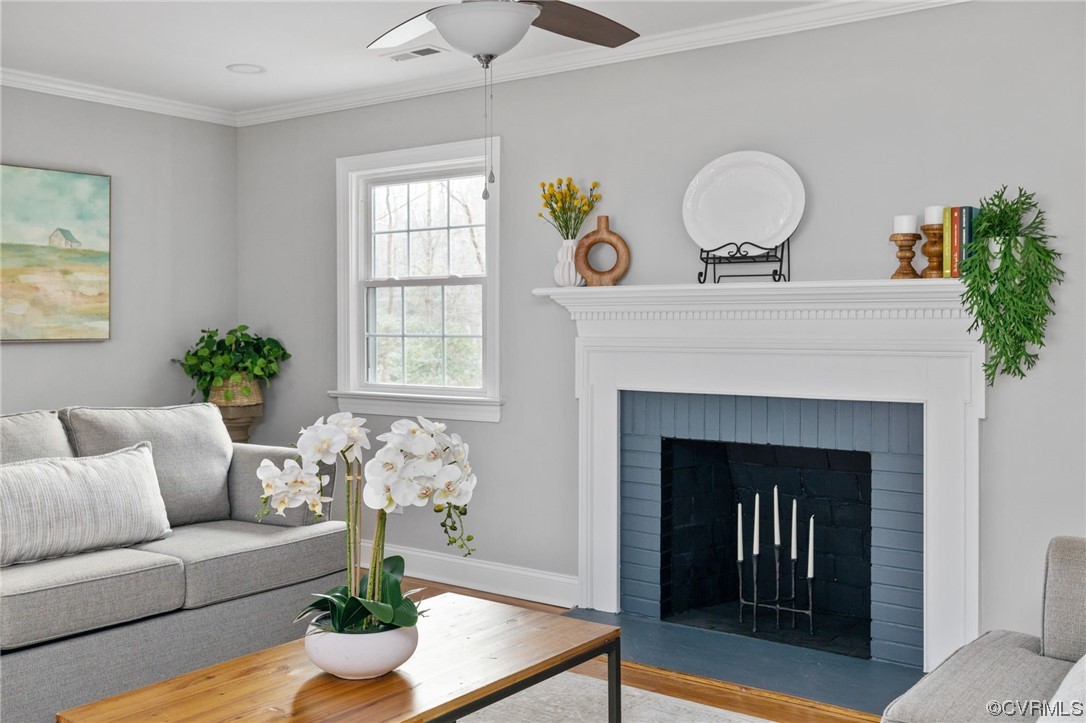 1818 Bloomfield Road Richmond, VA 23225 - Photo 17 of 45 a living room with furniture and a fireplace