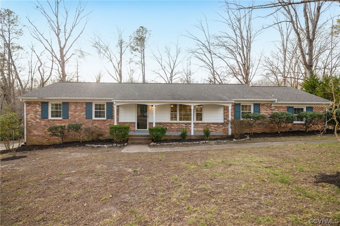 1818 Bloomfield Road Richmond, VA 23225 - Photo 2 of 45 front view of a house with a patio