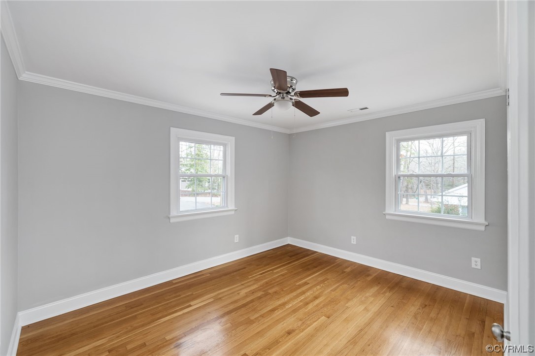 1818 Bloomfield Road Richmond, VA 23225 - Photo 23 of 45 a view of empty room with wooden floor and fan