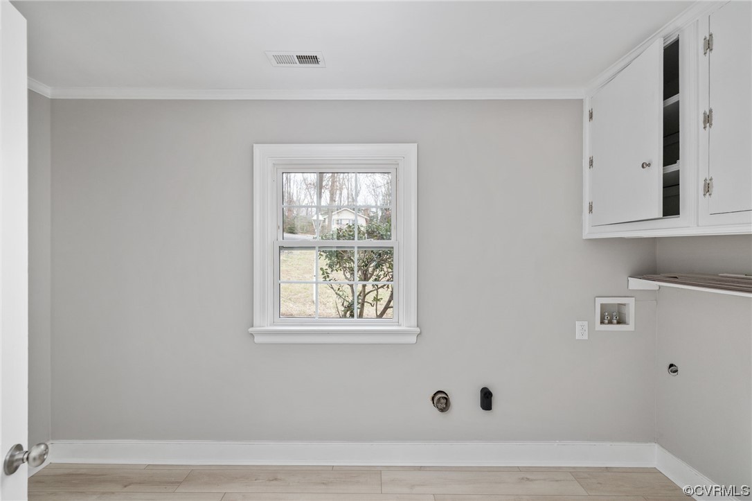 1818 Bloomfield Road Richmond, VA 23225 - Photo 26 of 45 a view of cabinets and window
