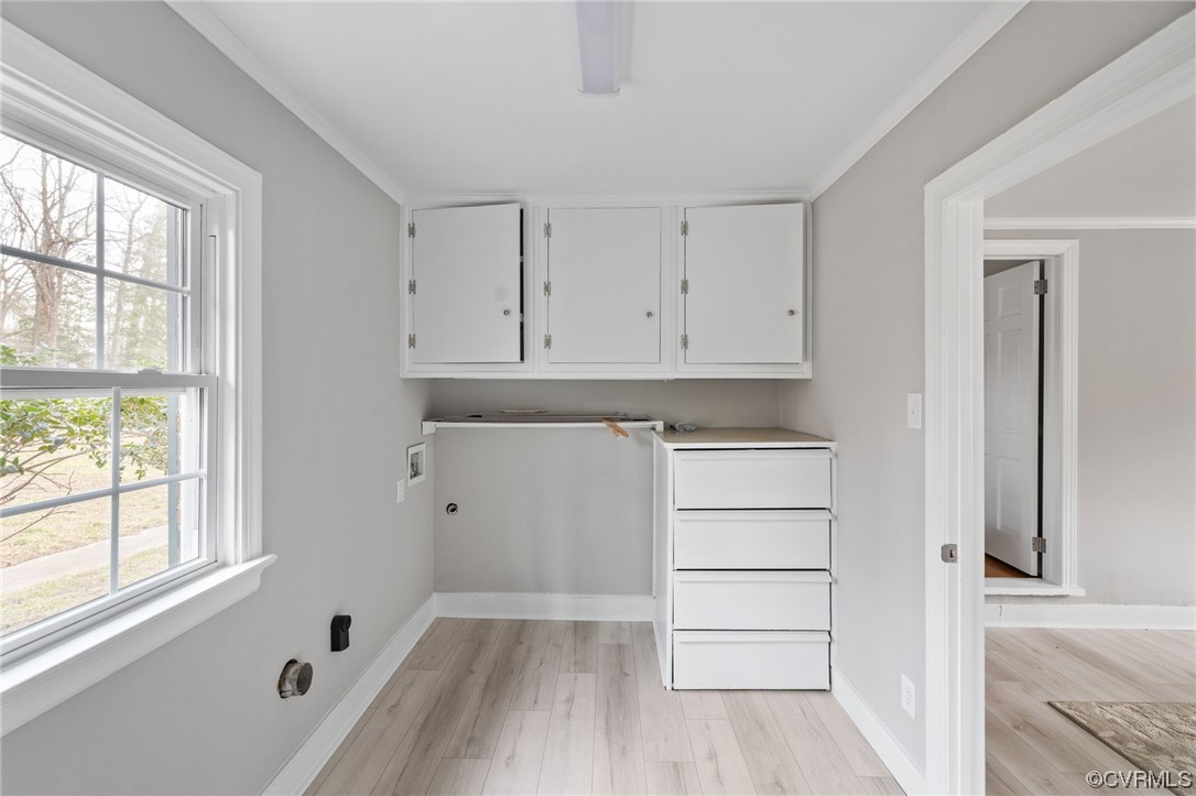 1818 Bloomfield Road Richmond, VA 23225 - Photo 27 of 45 a view of an empty walk in closet with a window