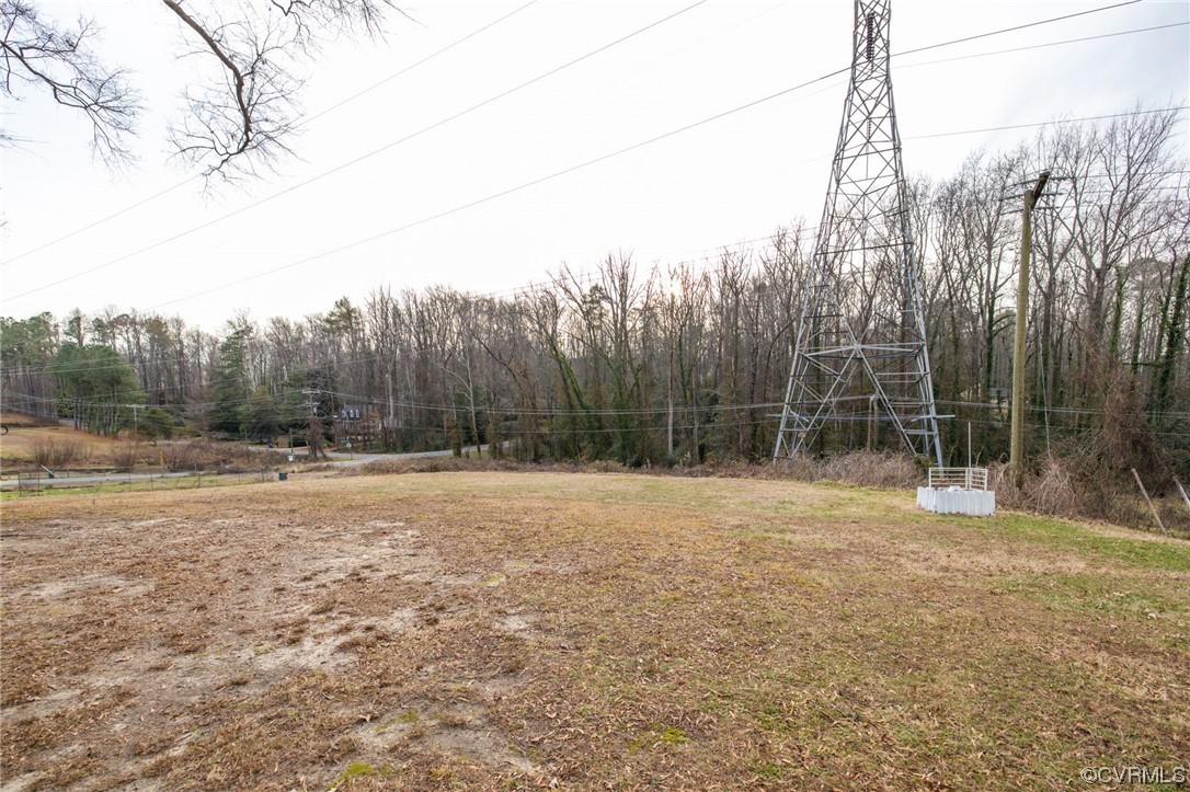1818 Bloomfield Road Richmond, VA 23225 - Photo 37 of 45 a view of a backyard with tall trees