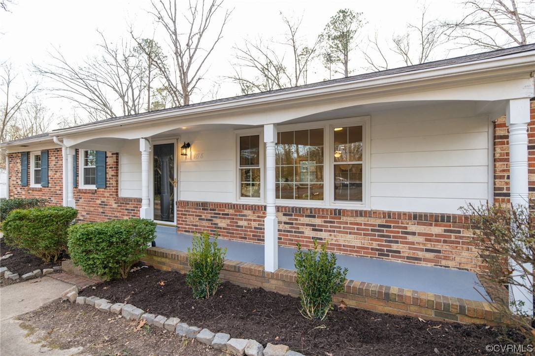 1818 Bloomfield Road Richmond, VA 23225 - Photo 4 of 45 a front view of a house with garden