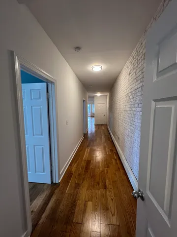 a bathroom with a sink a toilet and bathtub